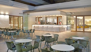 a room with tables and chairs