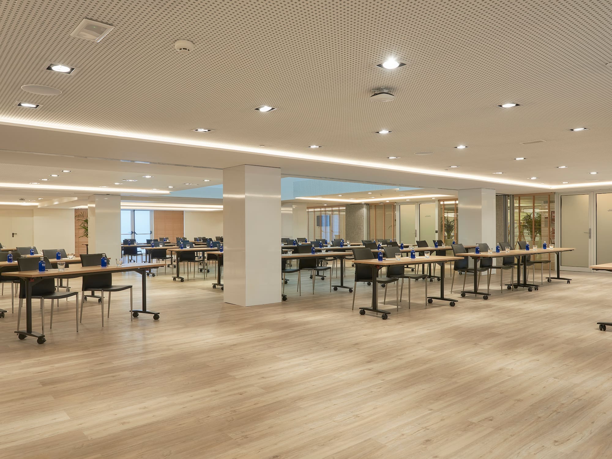 a large room with tables and chairs