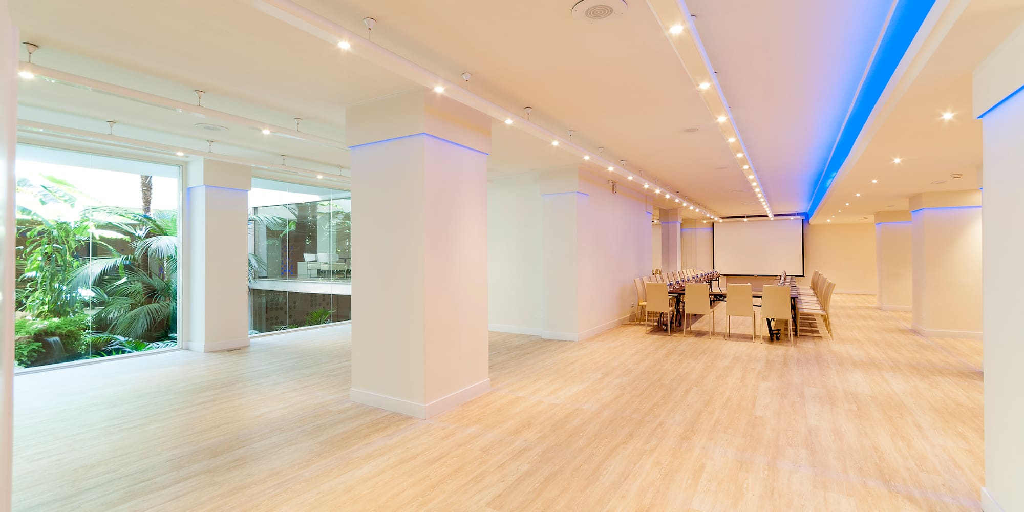 a room with a table and chairs