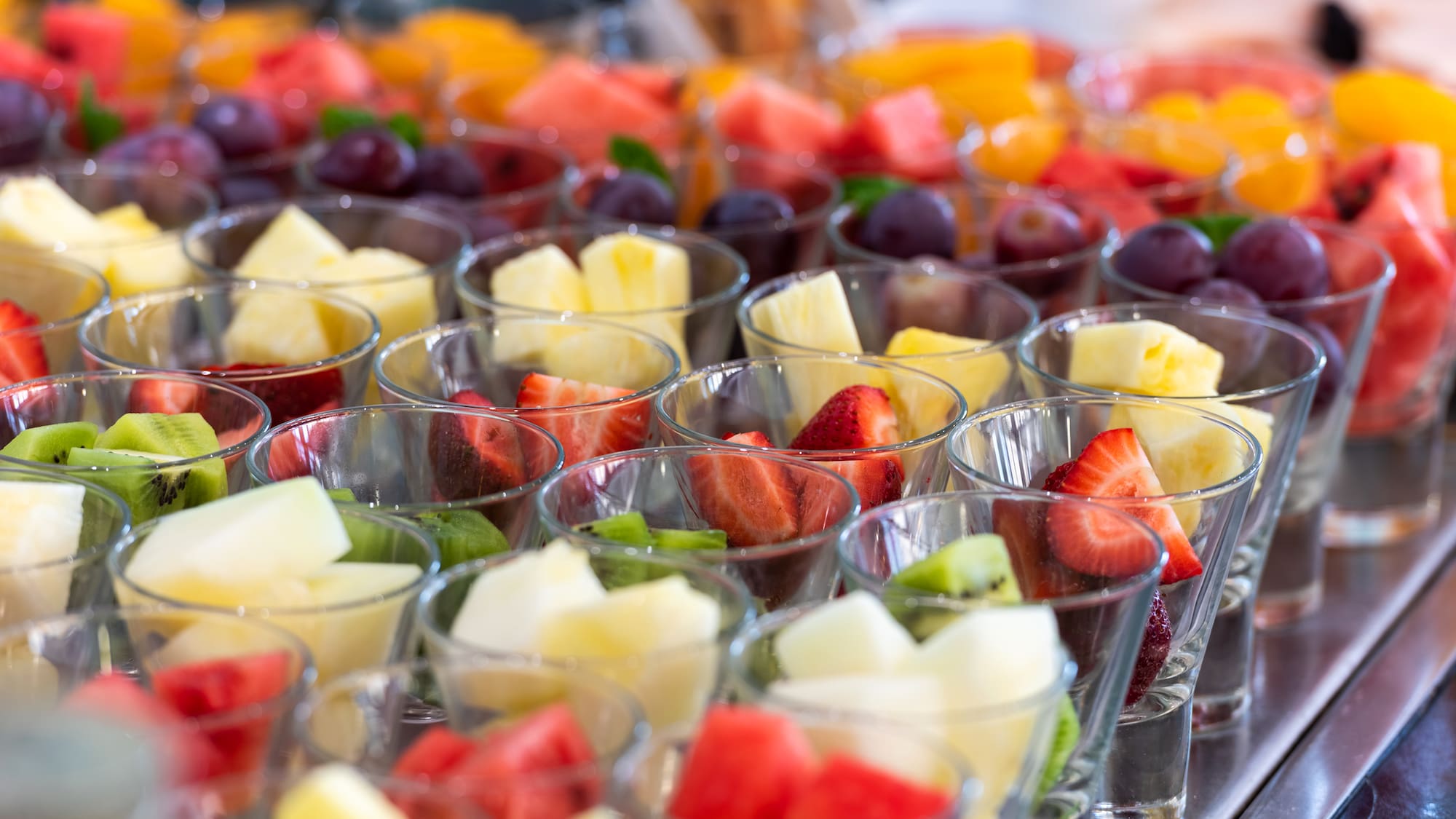 a group of glasses of fruit