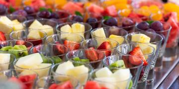 a group of glasses of fruit