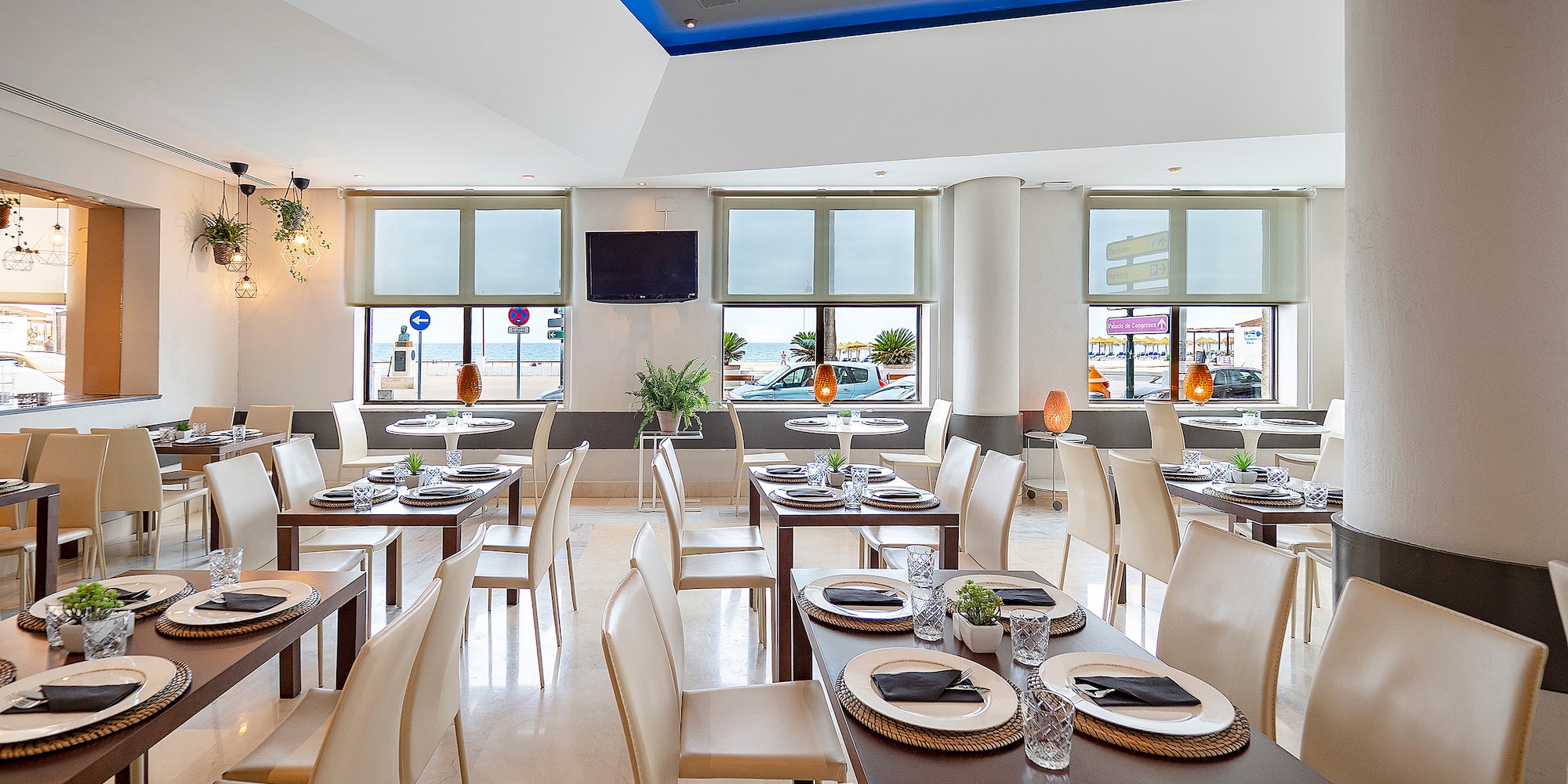 a room with tables and chairs