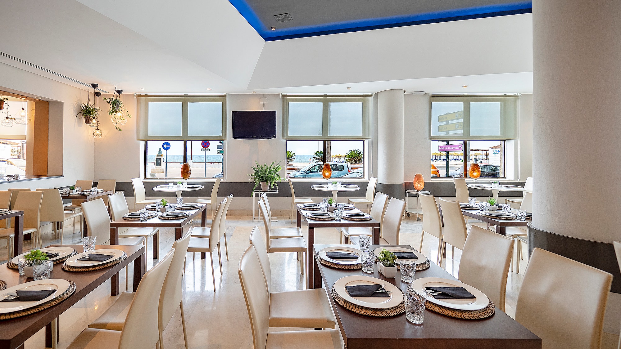 a room with tables and chairs