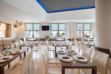 a room with tables and chairs