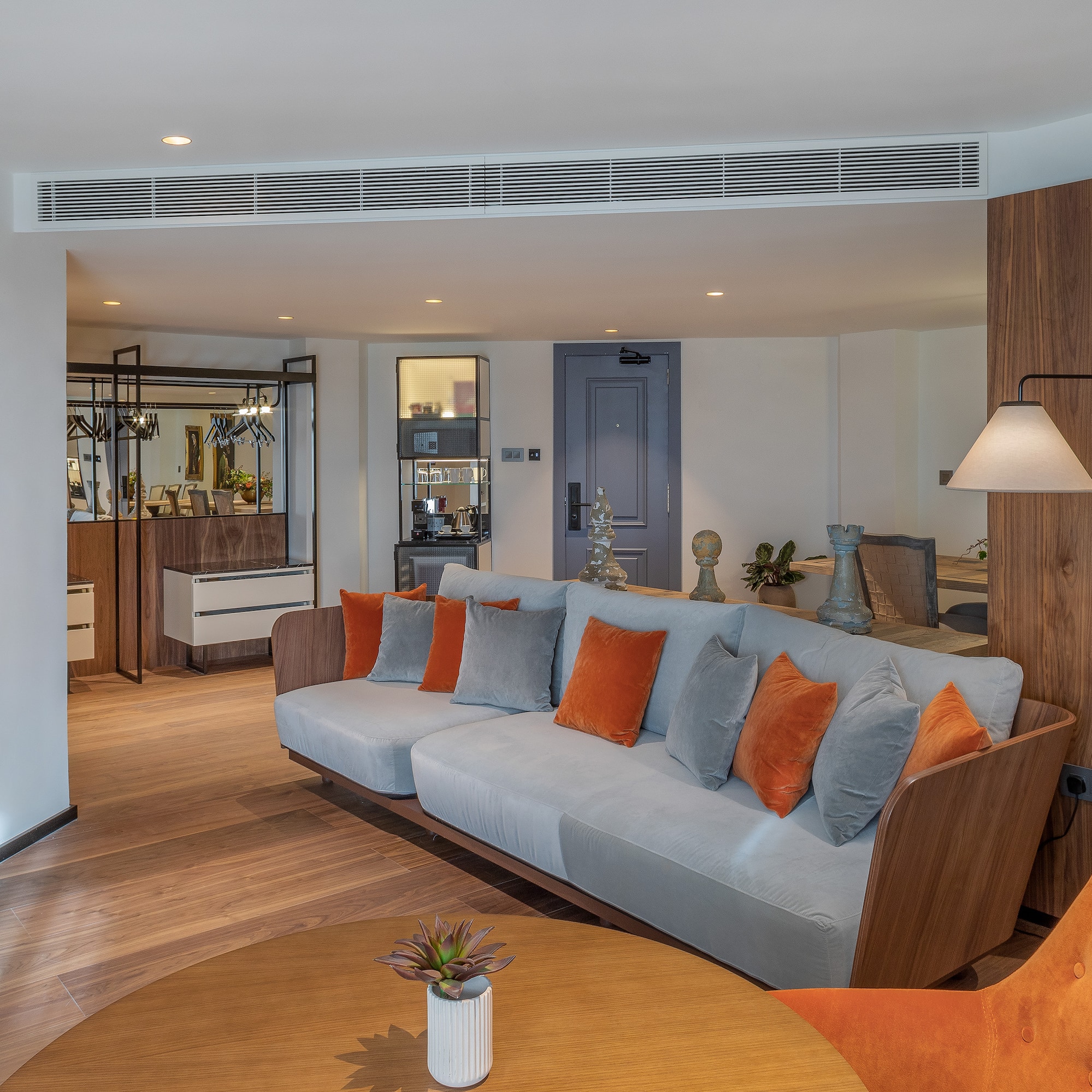 a living room with a couch and a table