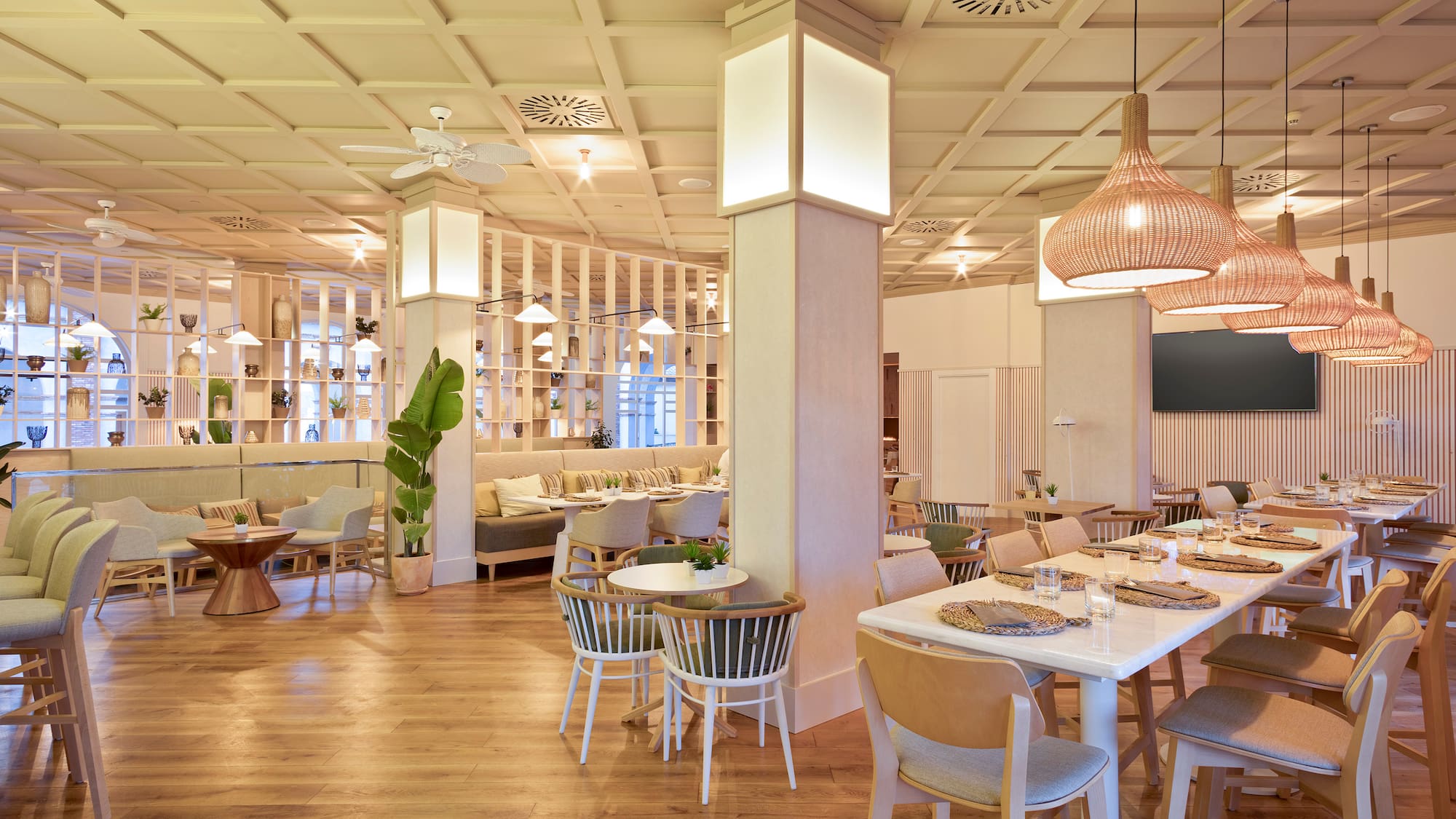 a restaurant with tables and chairs