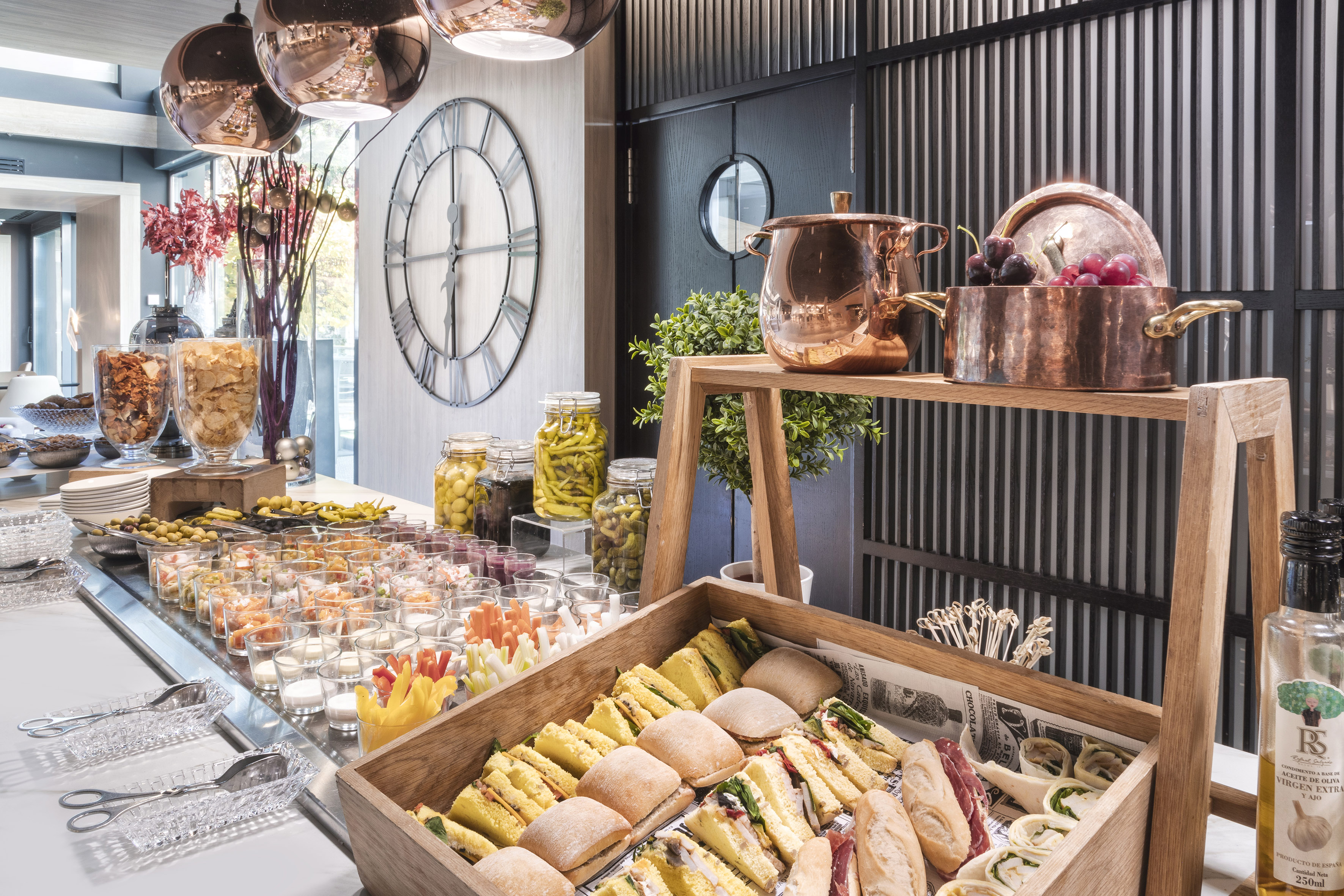 a buffet table with food and drinks