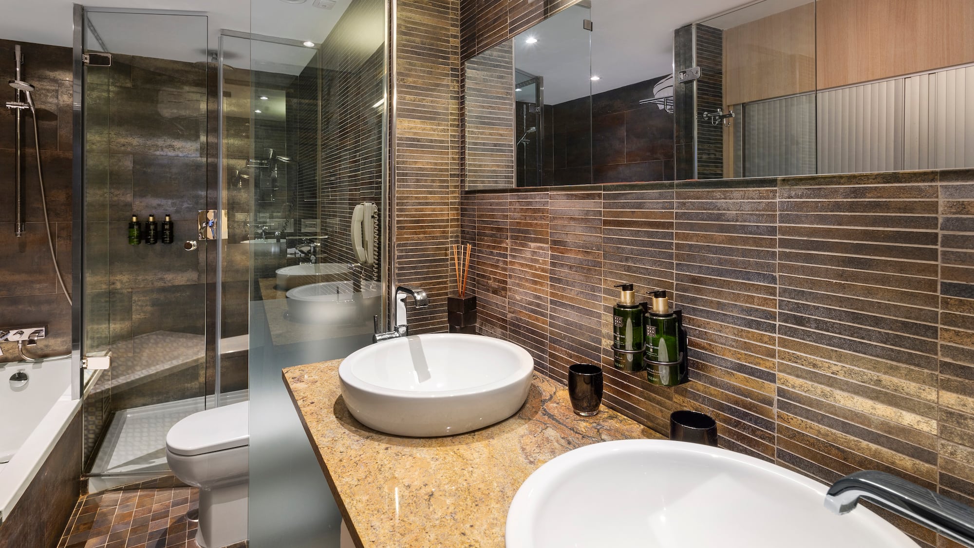 a bathroom with a shower and sink