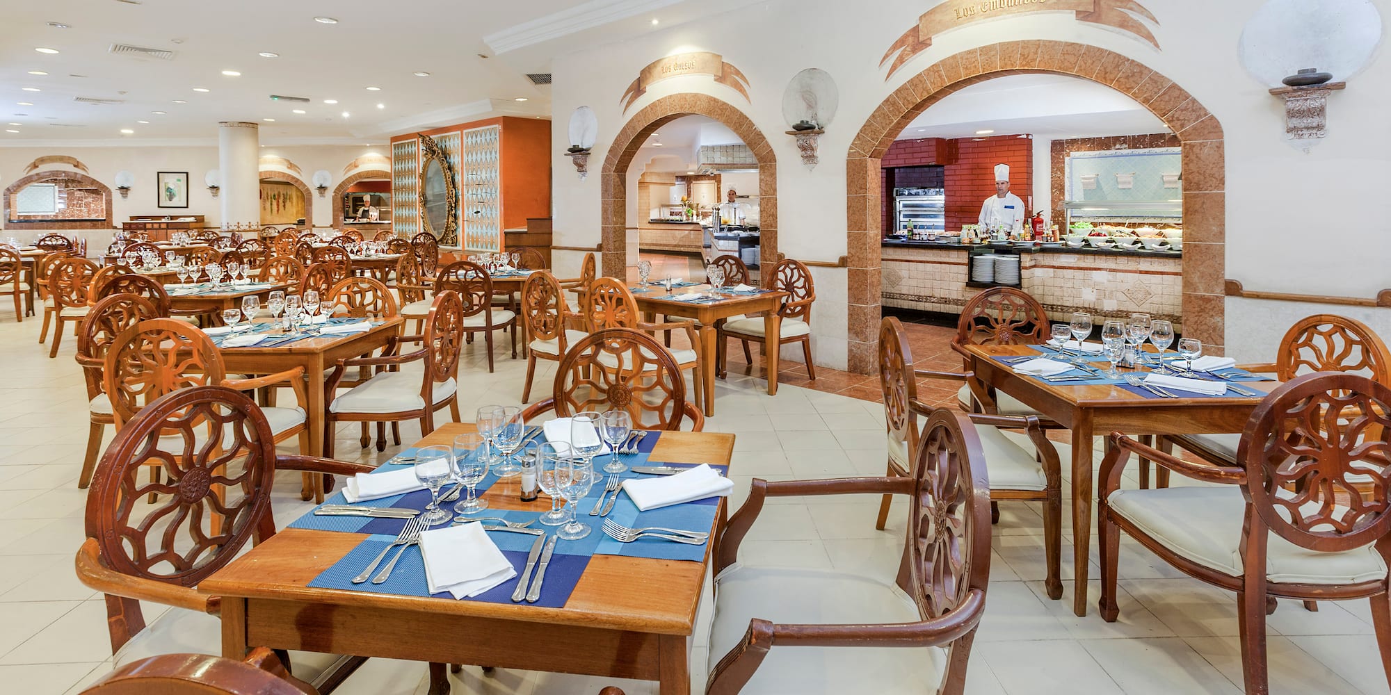 a restaurant with tables and chairs