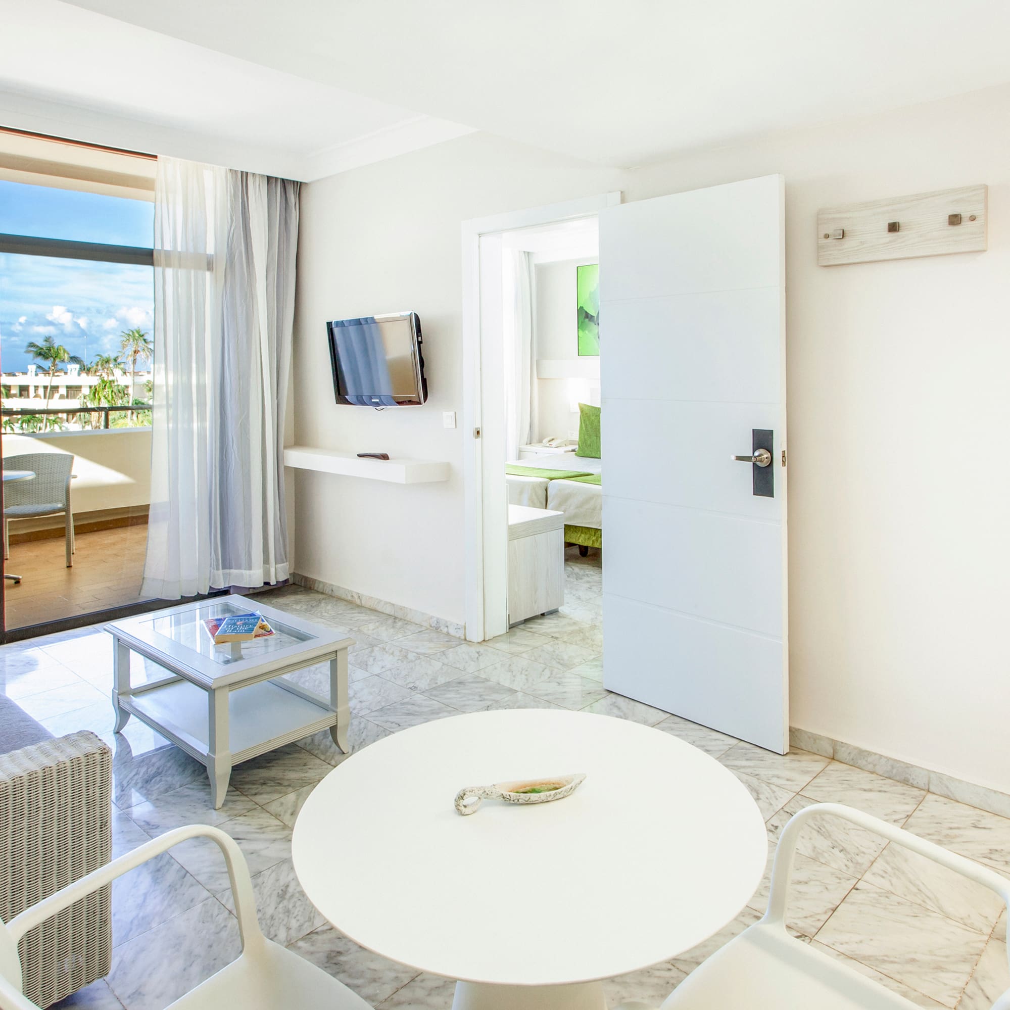 a room with a table and chairs