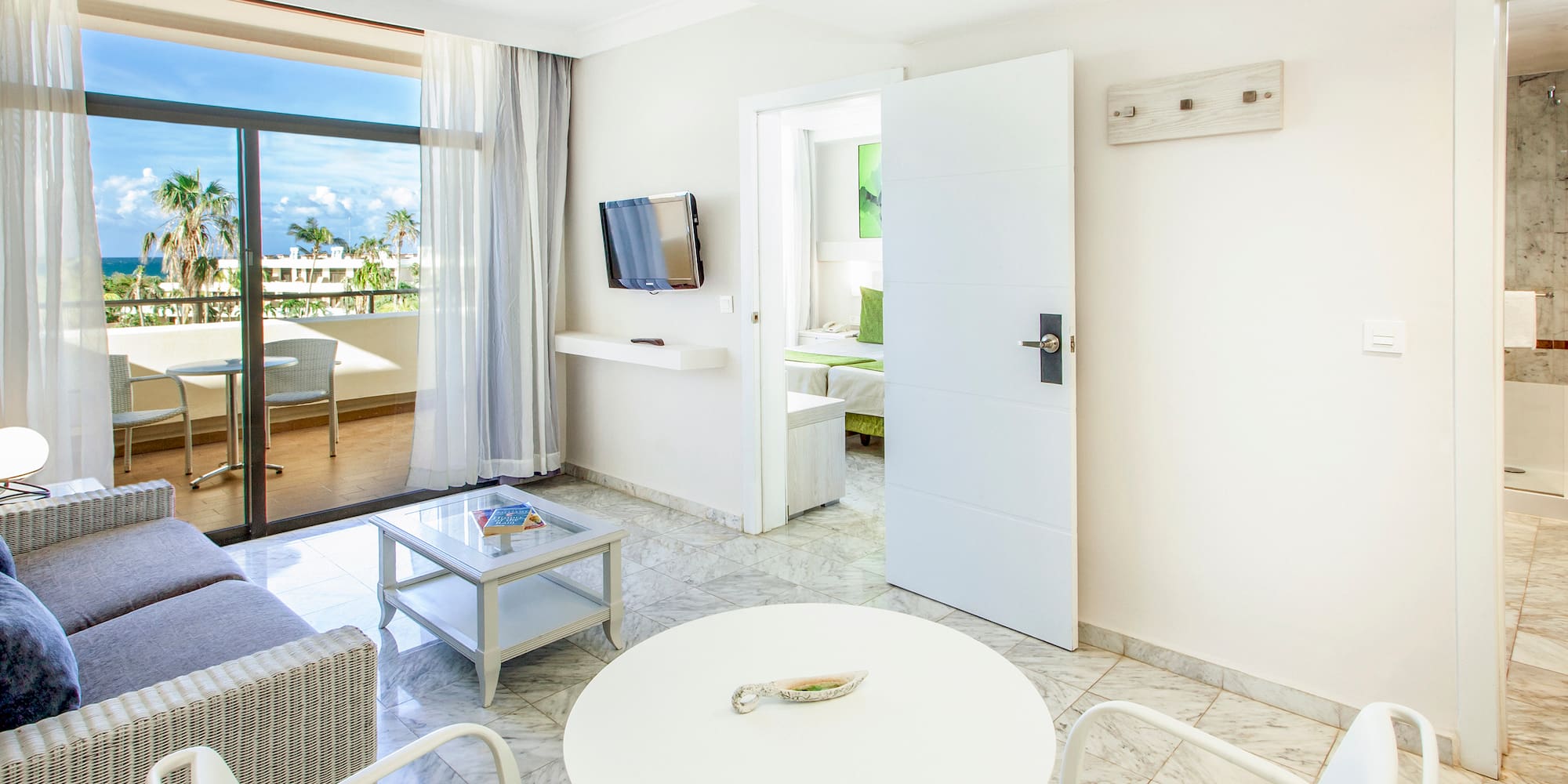 a room with a table and chairs