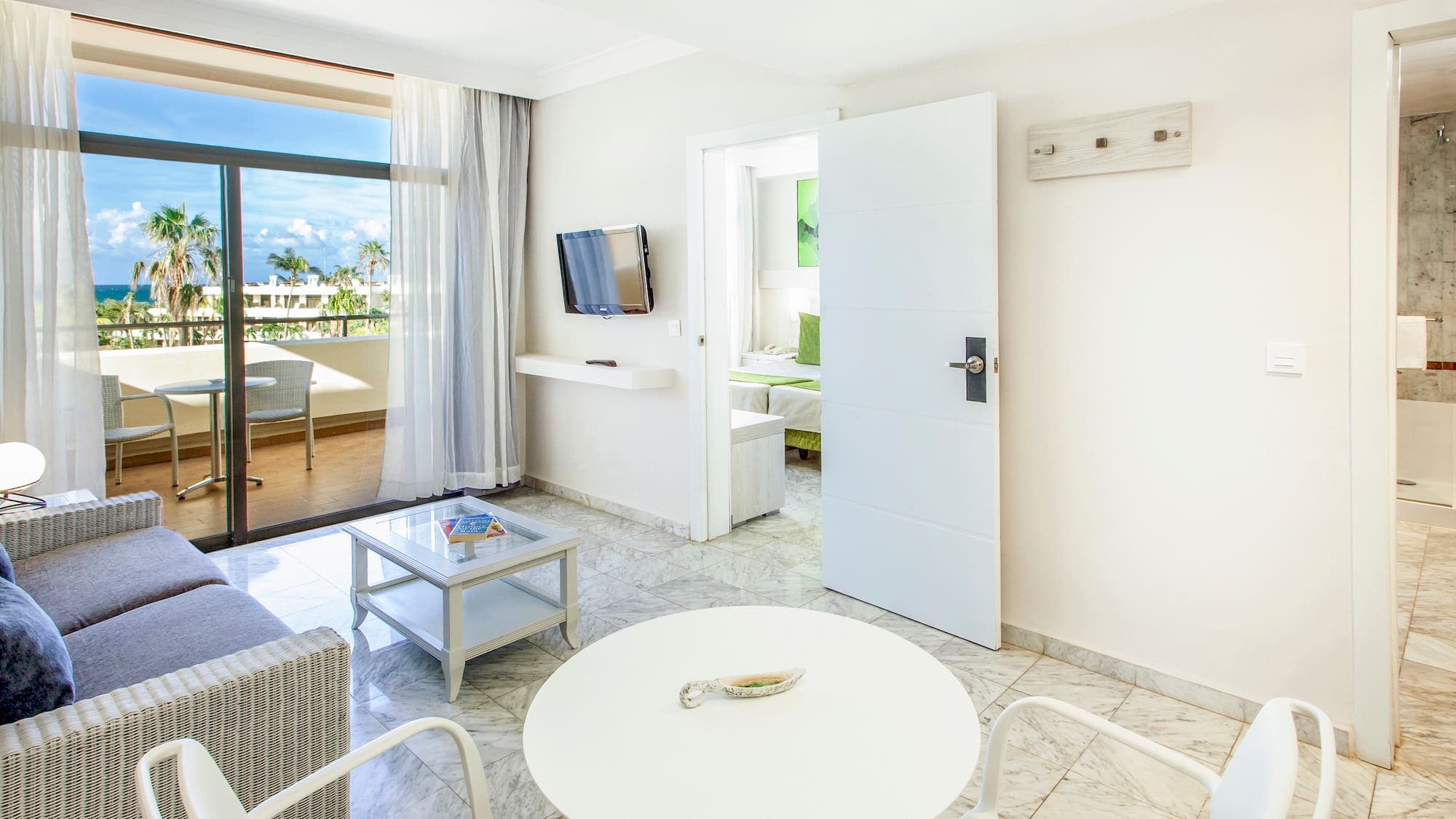 a room with a table and chairs