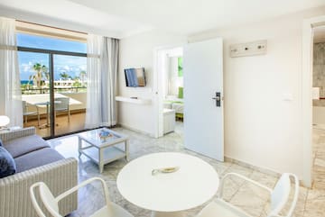 a room with a table and chairs