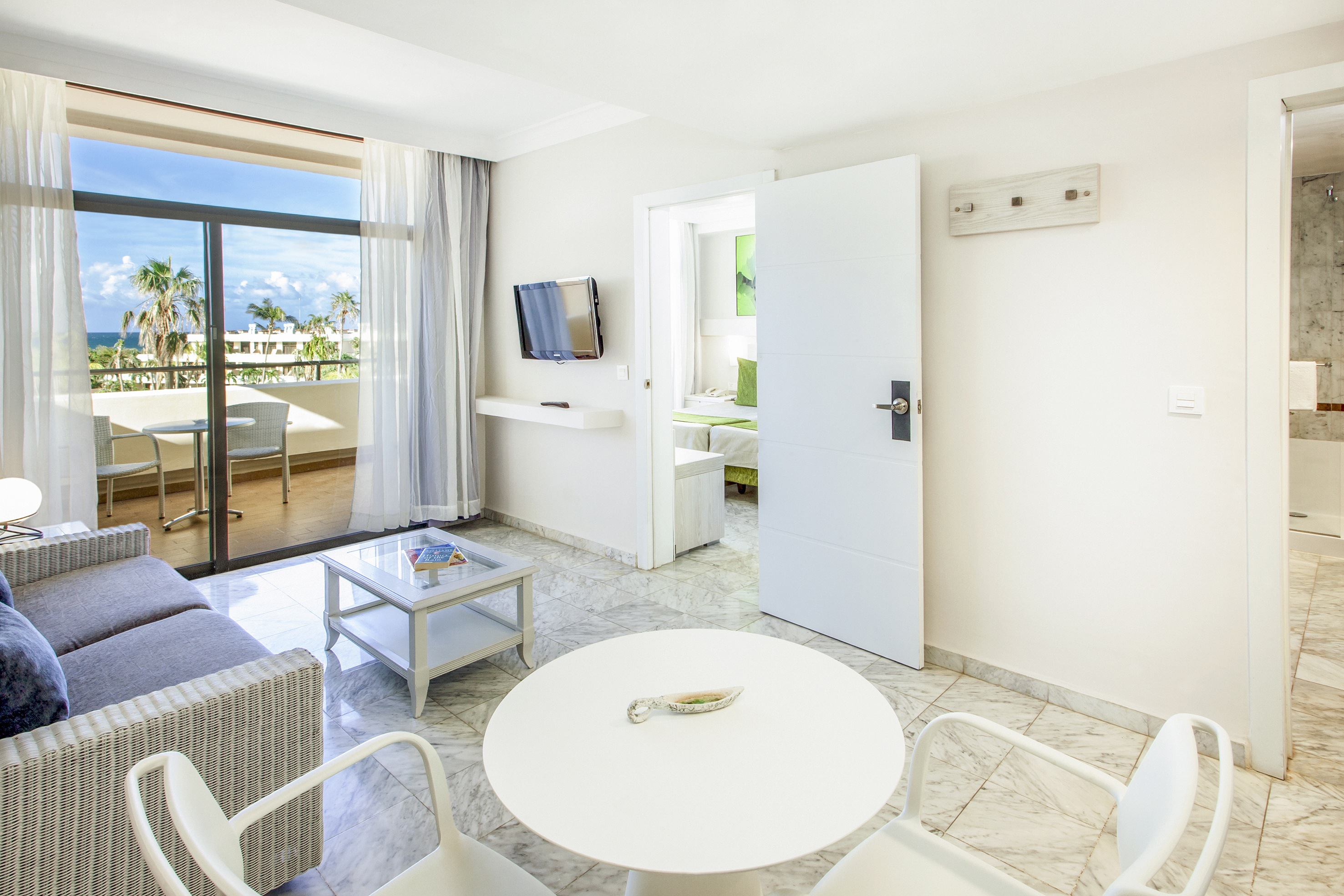 a room with a table and chairs