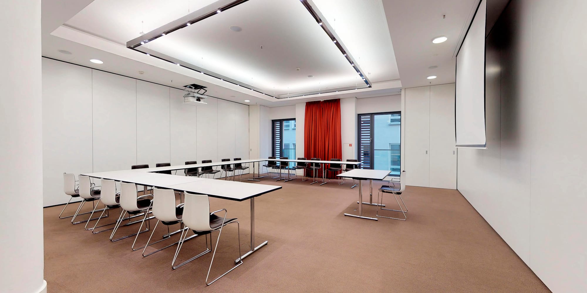 a room with tables and chairs