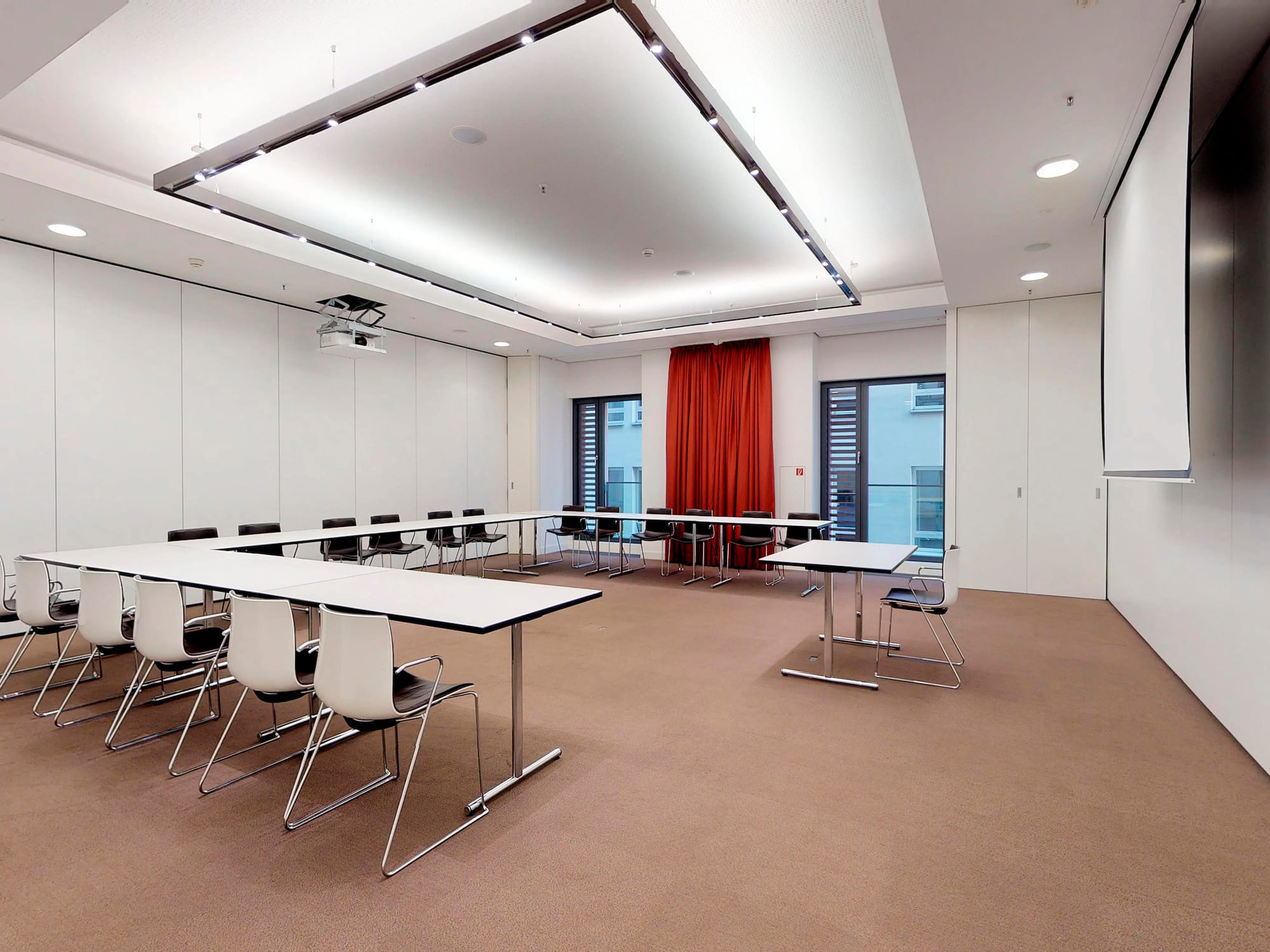 a room with tables and chairs