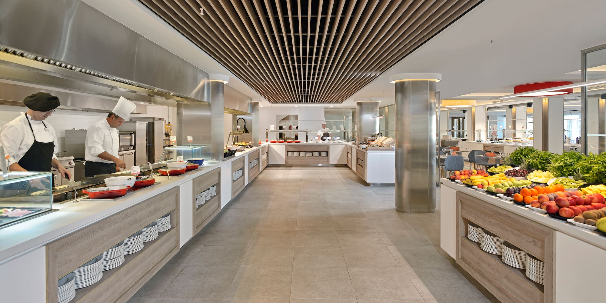 a large kitchen with food on the counter