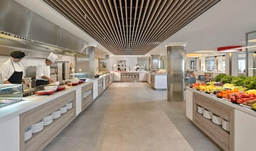 a large kitchen with food on the counter