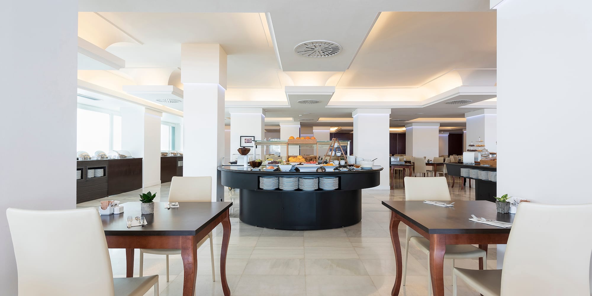 a restaurant with a buffet table