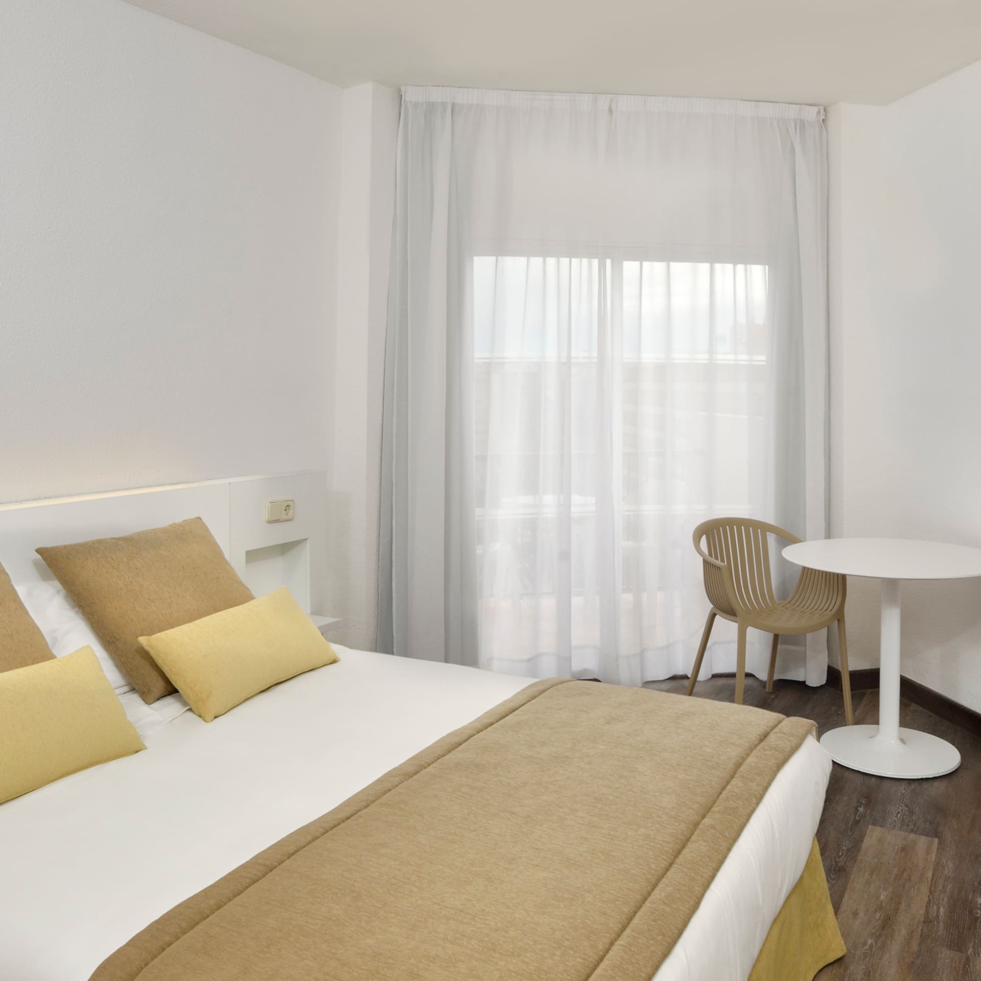 a room with a bed and a table