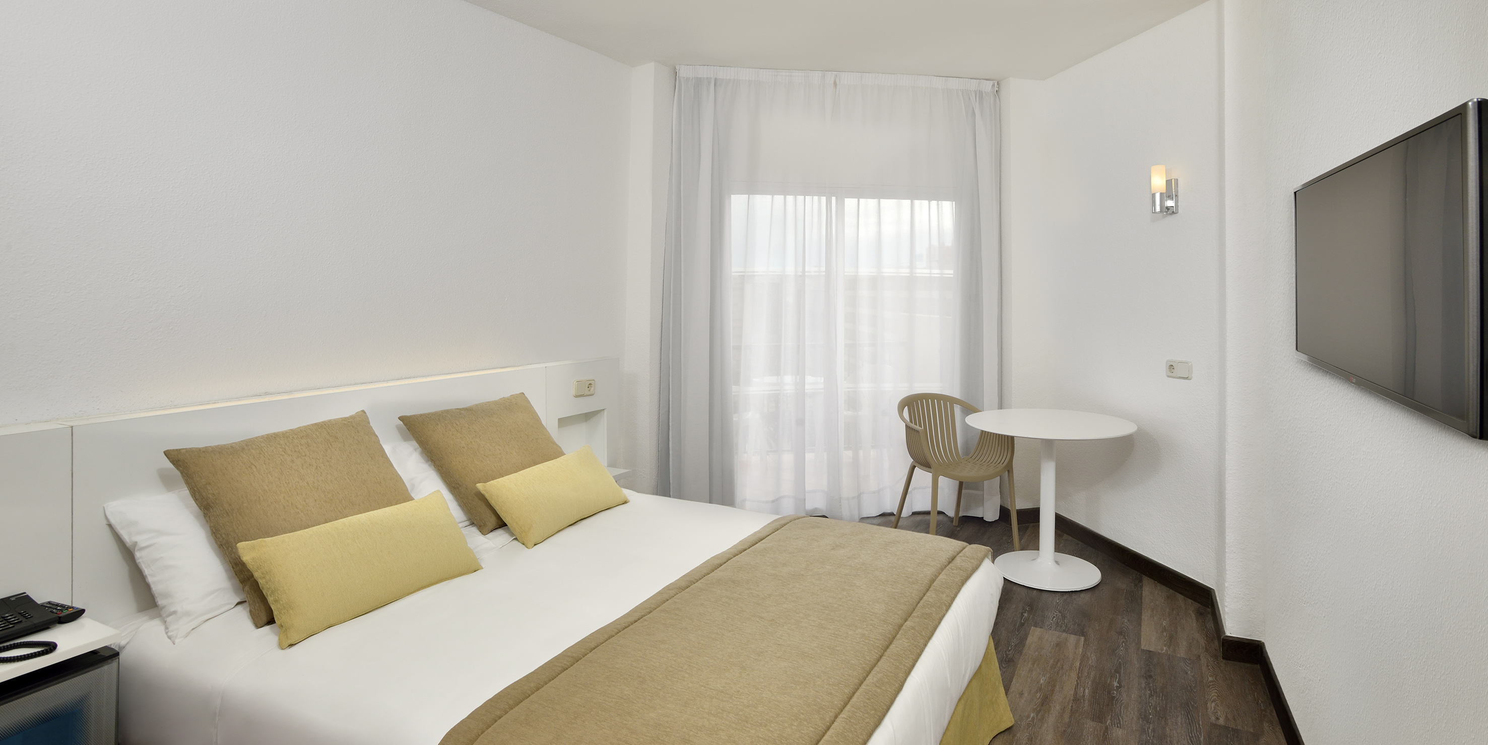 a room with a bed and a table