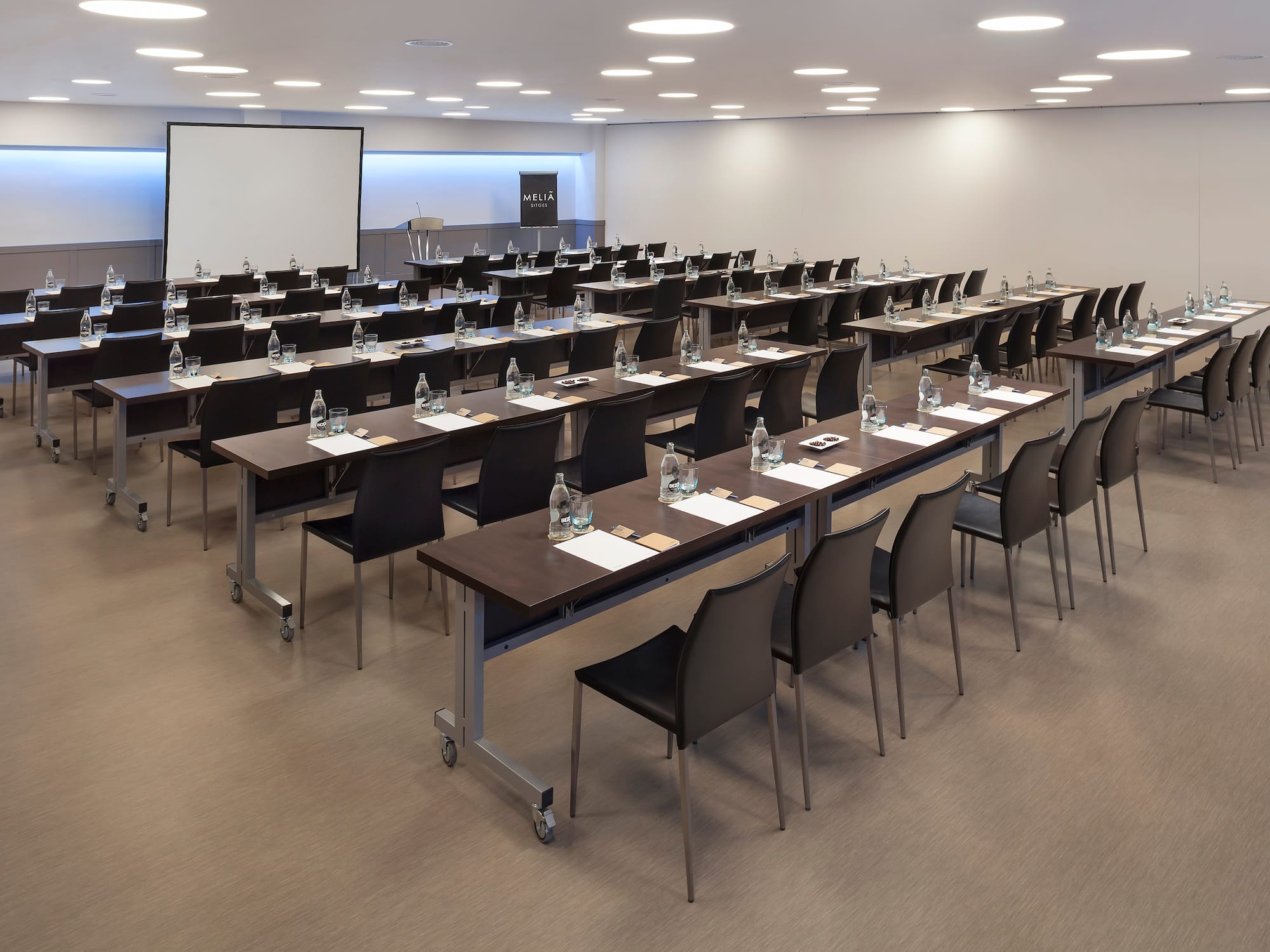 a room with tables and chairs