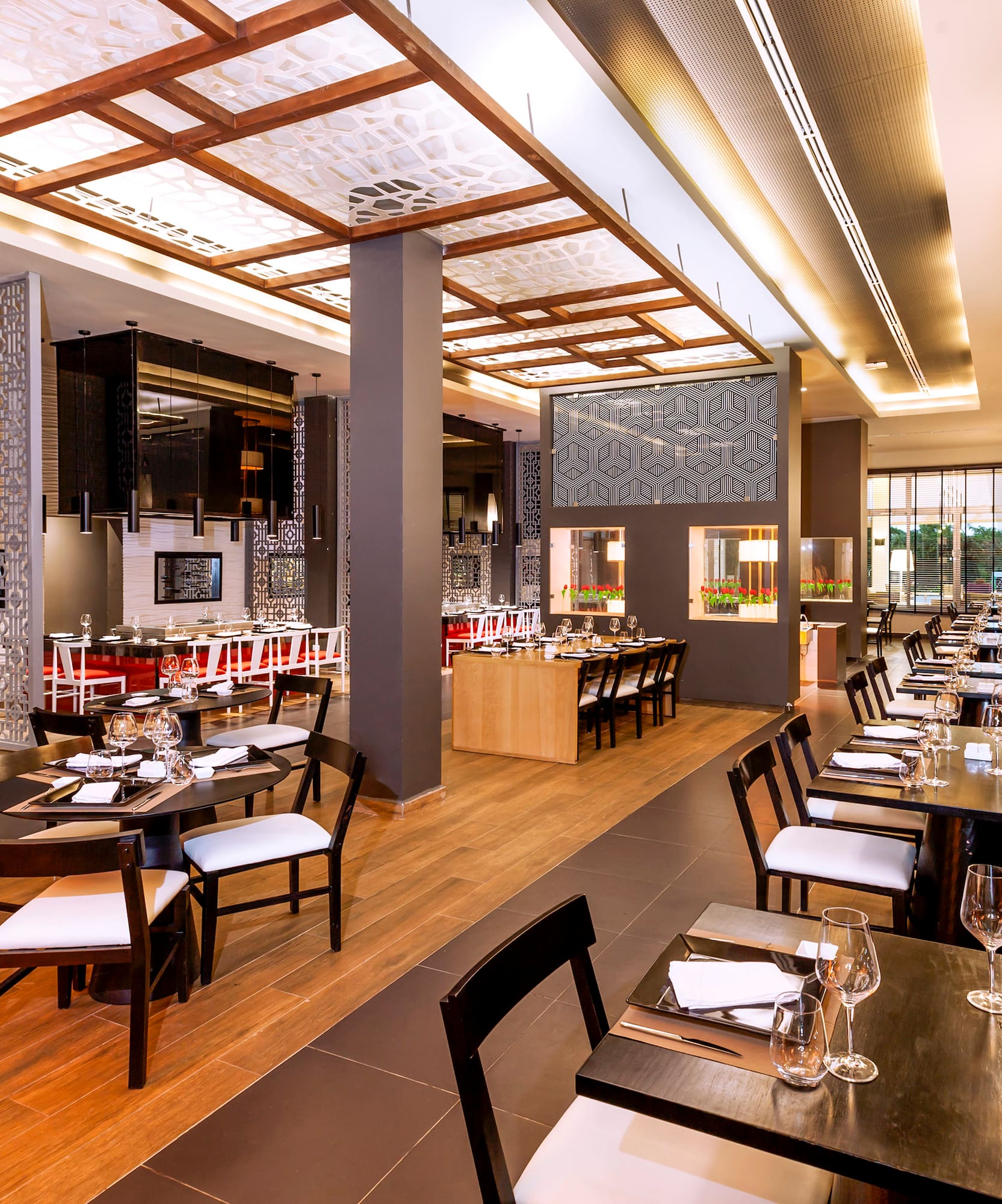 a restaurant with tables and chairs