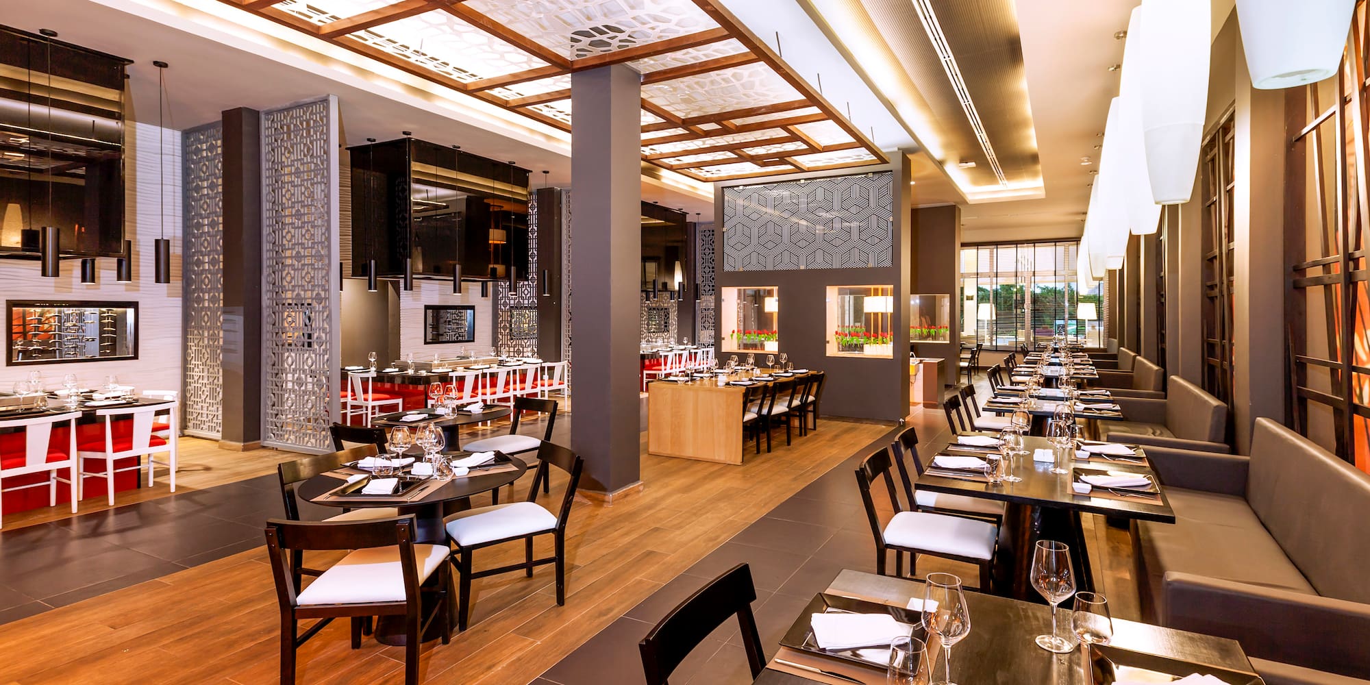 a restaurant with tables and chairs