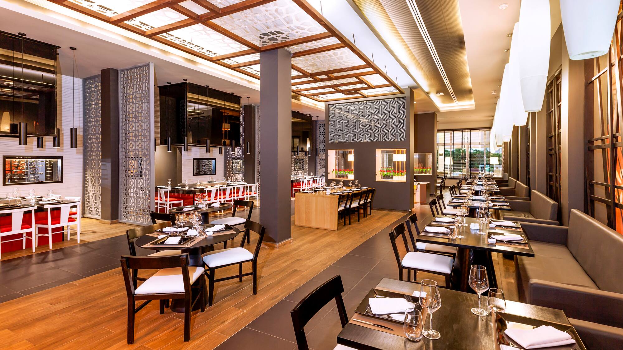 a restaurant with tables and chairs