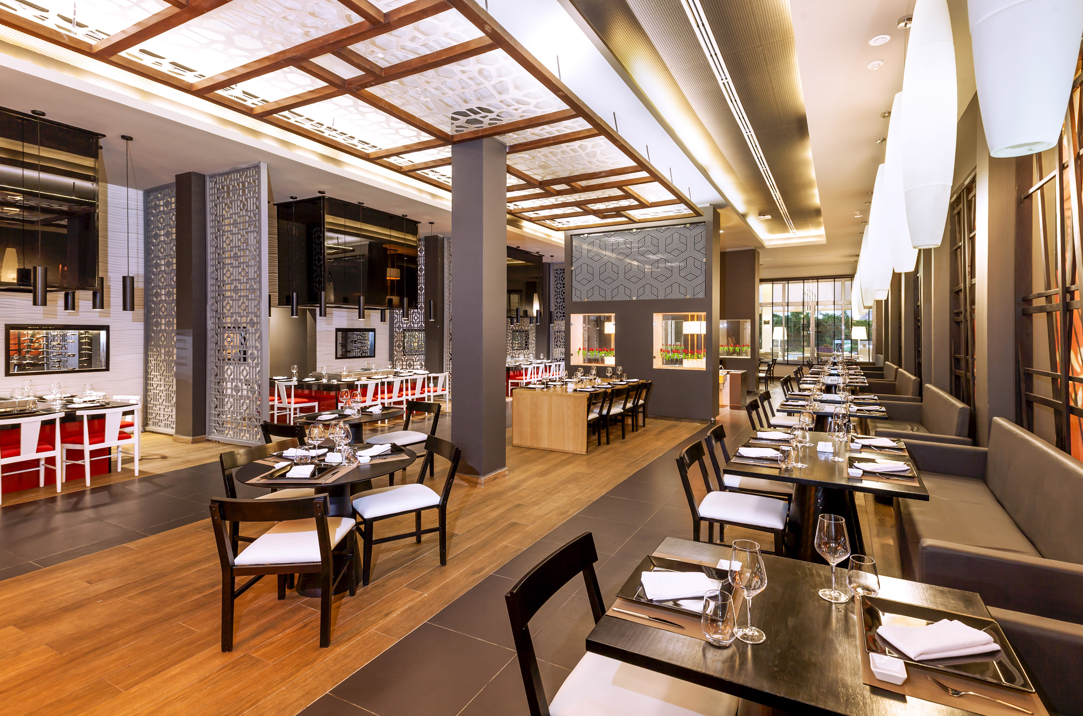 a restaurant with tables and chairs