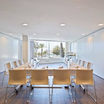 a room with a table and chairs