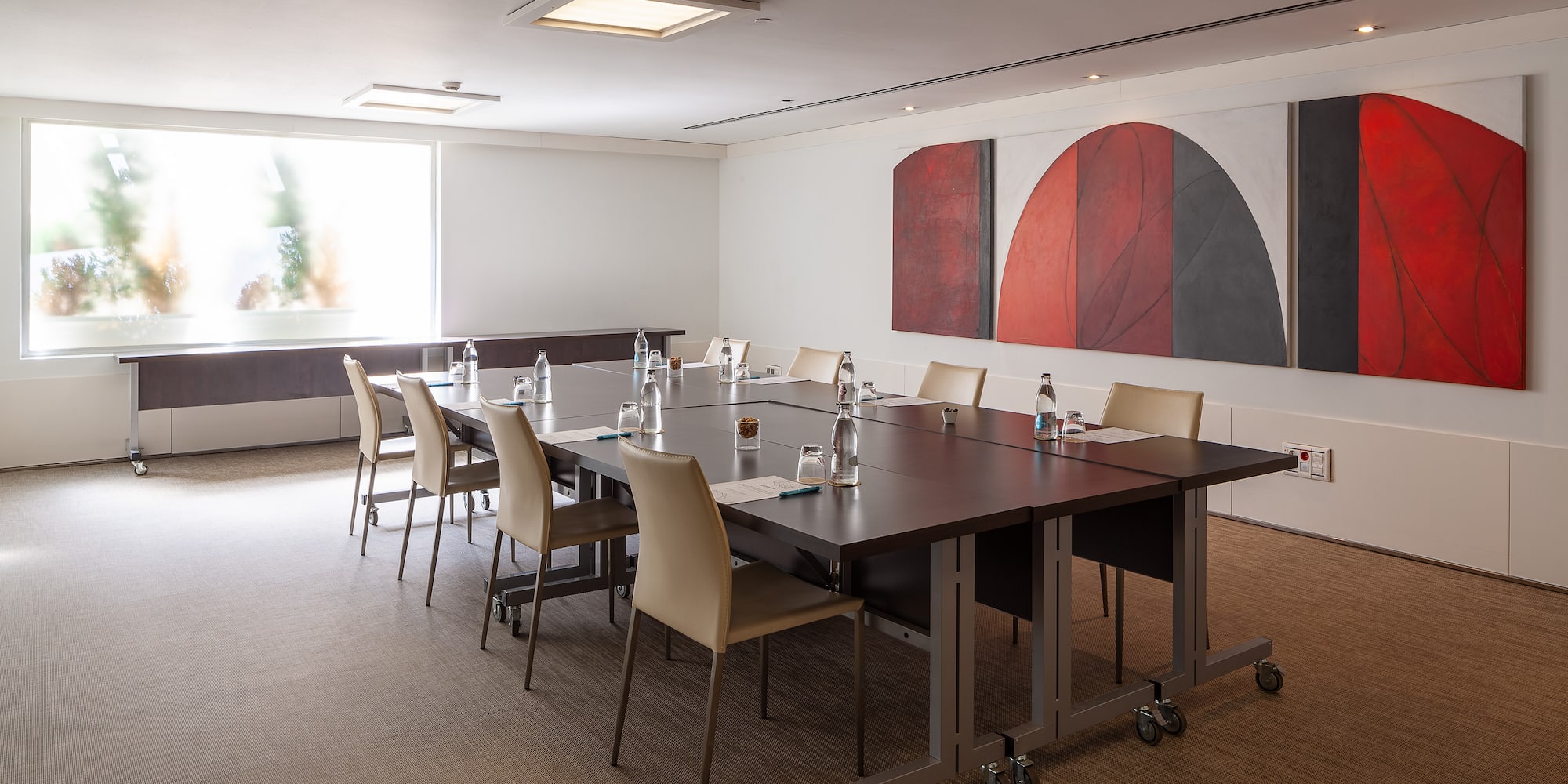 a room with a table and chairs