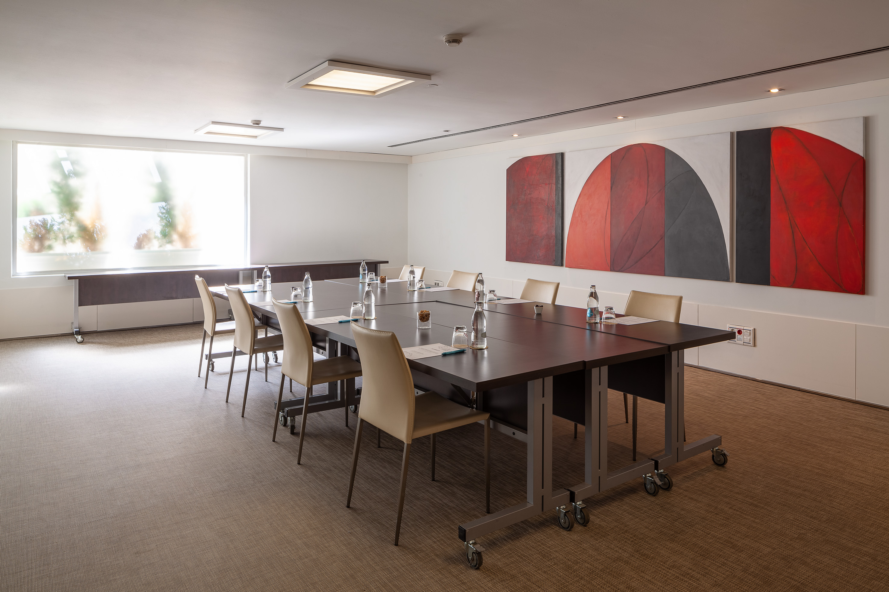 a room with a table and chairs