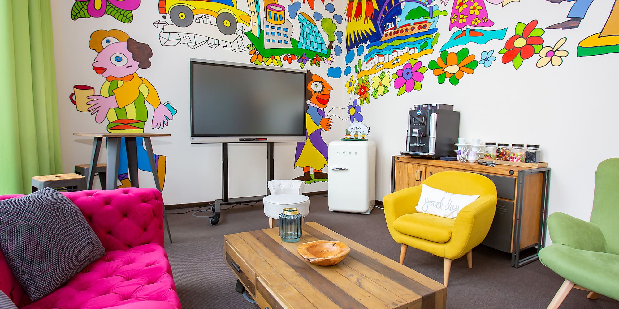 a room with a tv and a couch