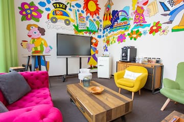 a room with a tv and a couch