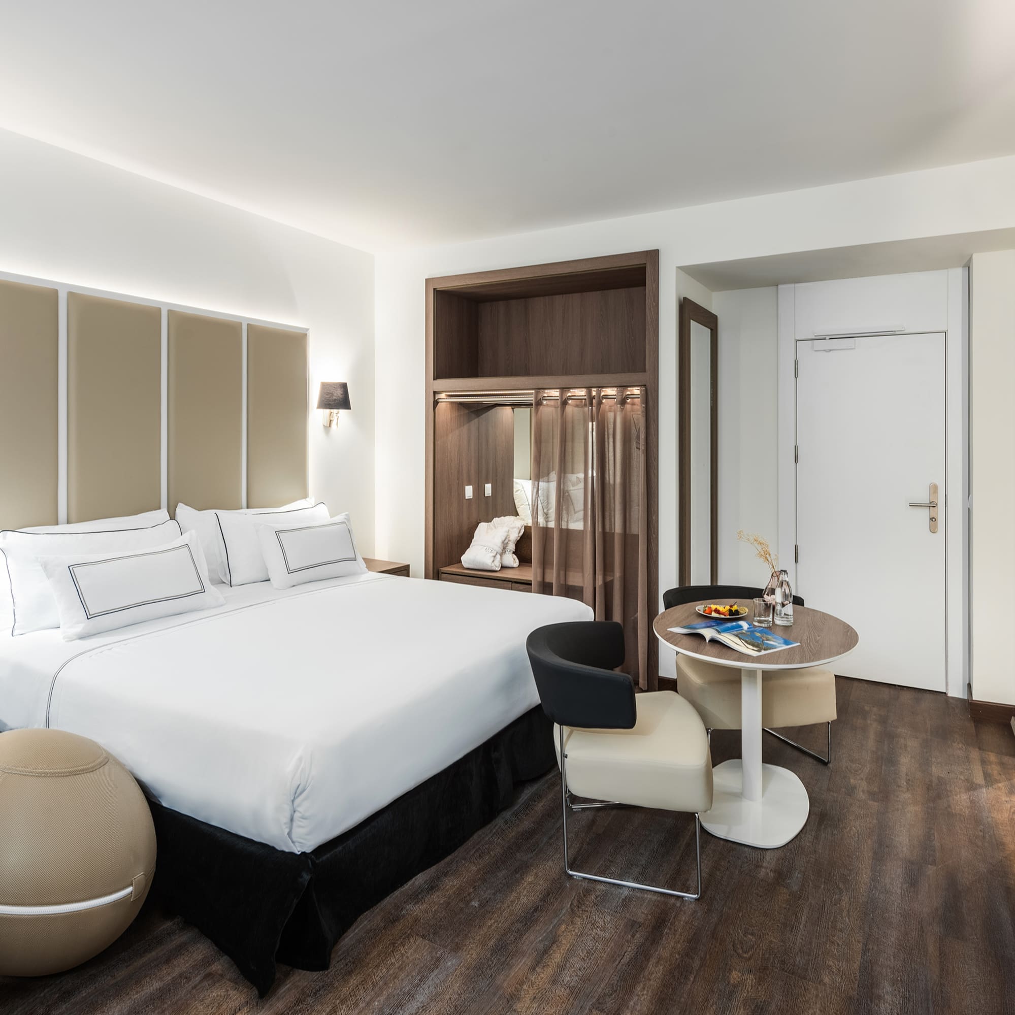 a room with a bed and a table