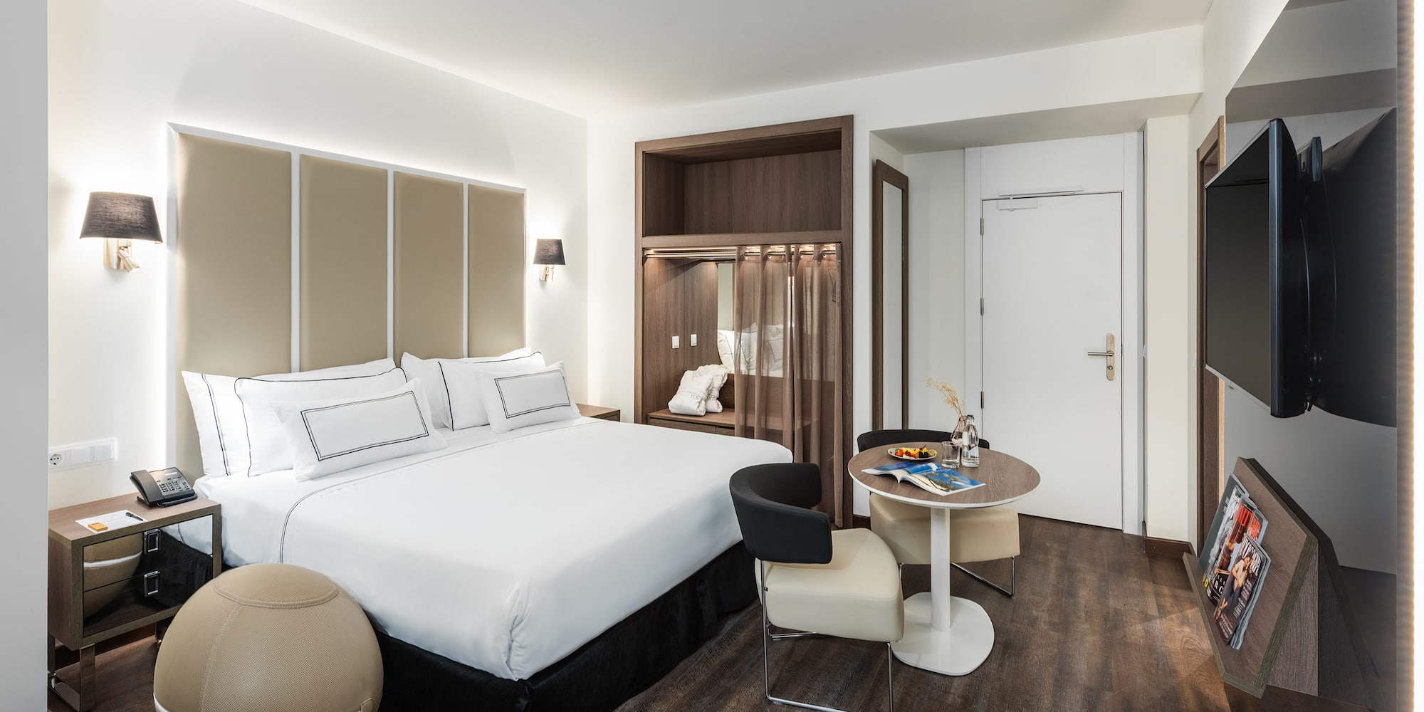 a room with a bed and a table