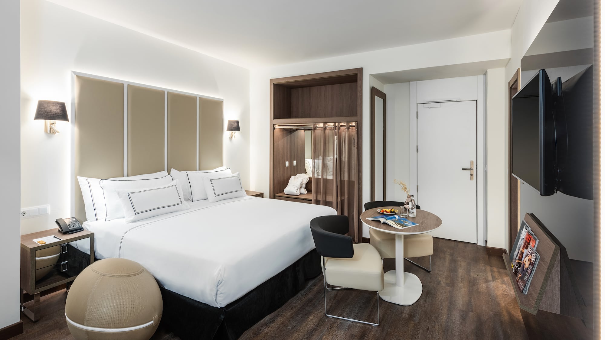 a room with a bed and a table