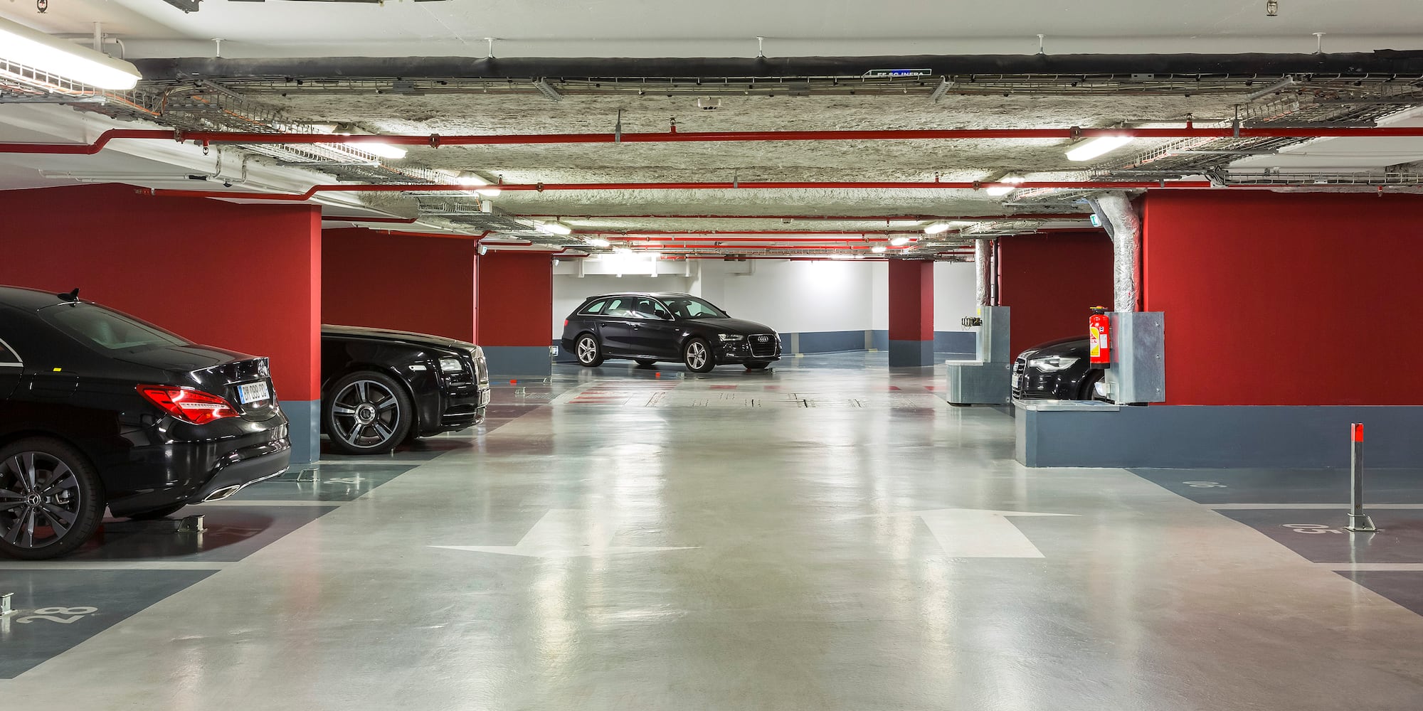a parking garage with cars