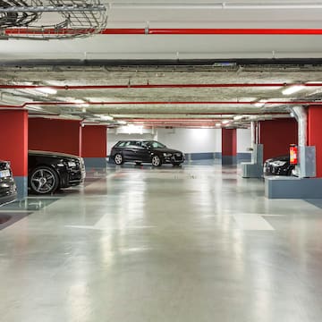 a parking garage with cars