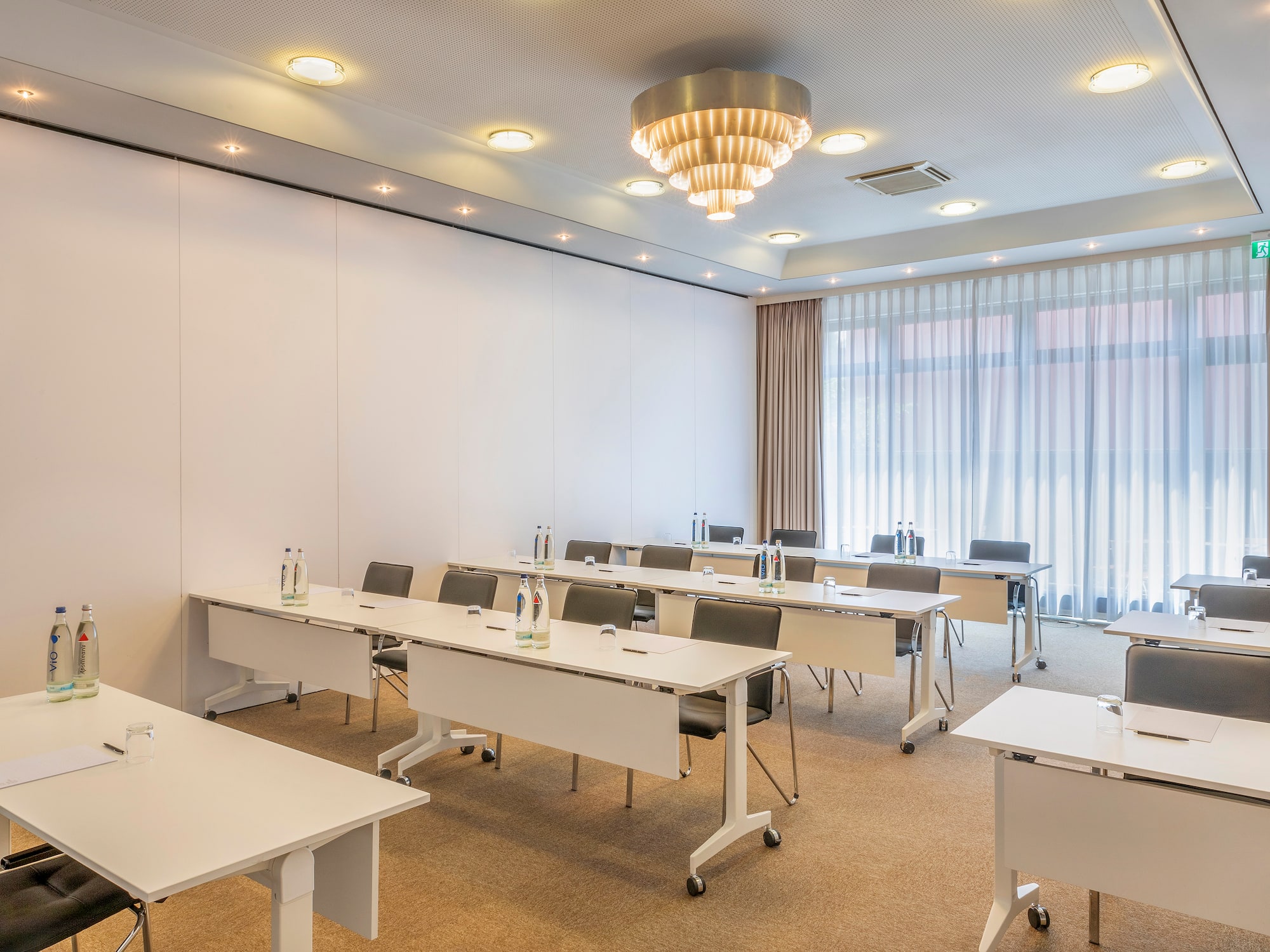 a room with tables and chairs