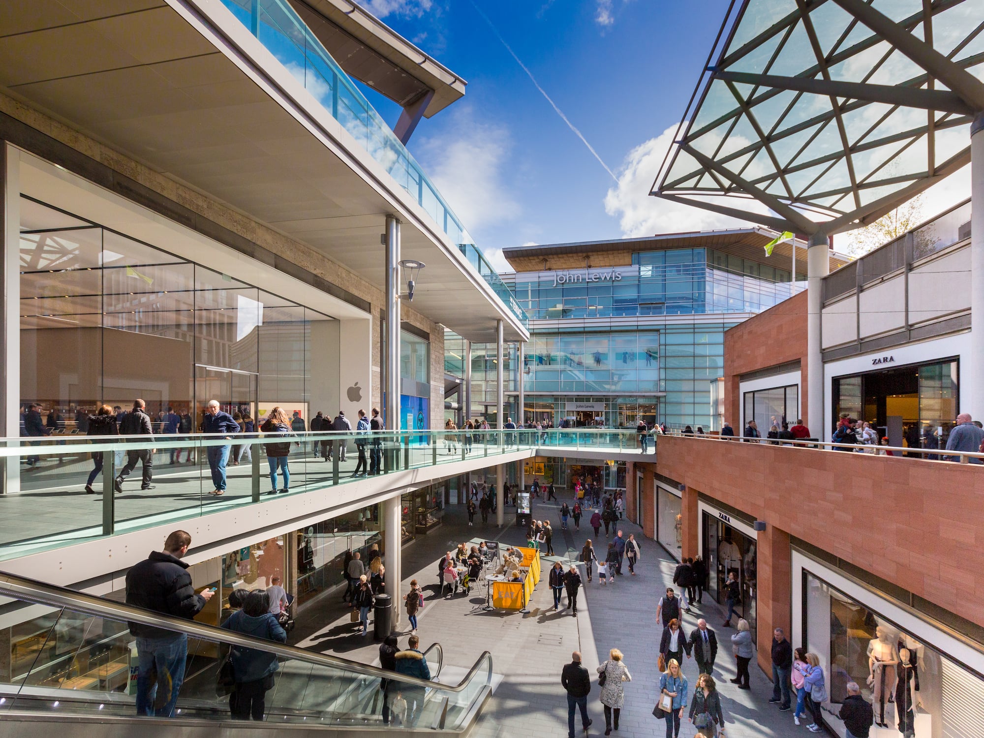 a group of people in a mall