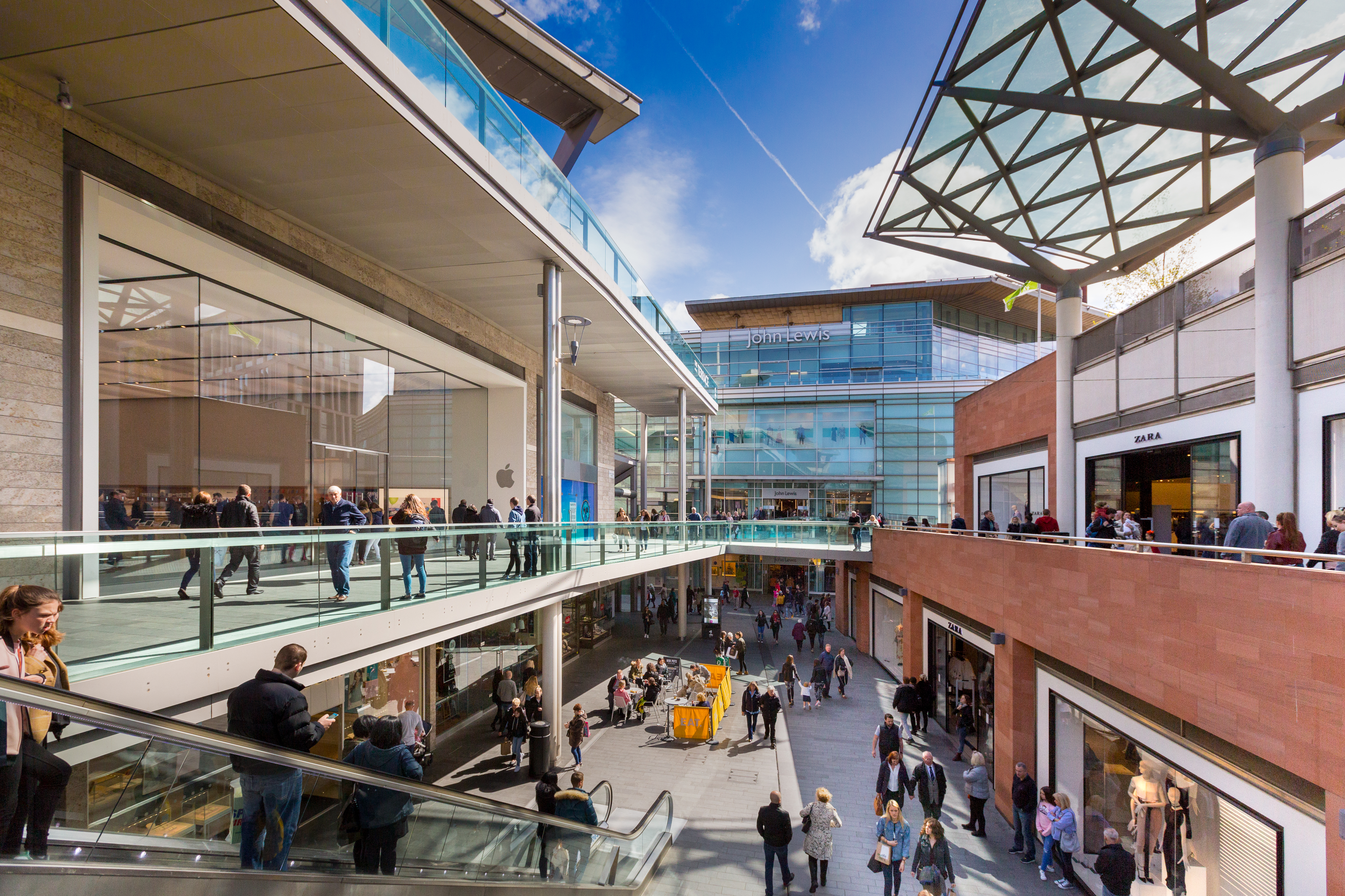 a group of people in a mall