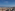 a city with many buildings and a body of water