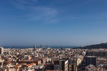 a city with many buildings and a body of water