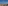 Barcelona panoramic skyline with sea, urban buildings, and clear blue sky.