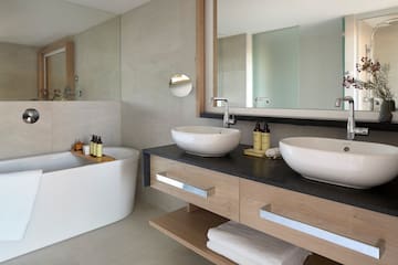a bathroom with a sink and tub