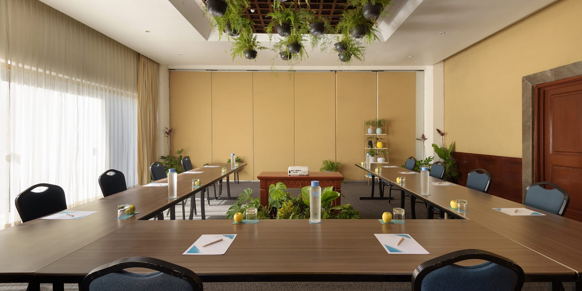 a room with tables and chairs