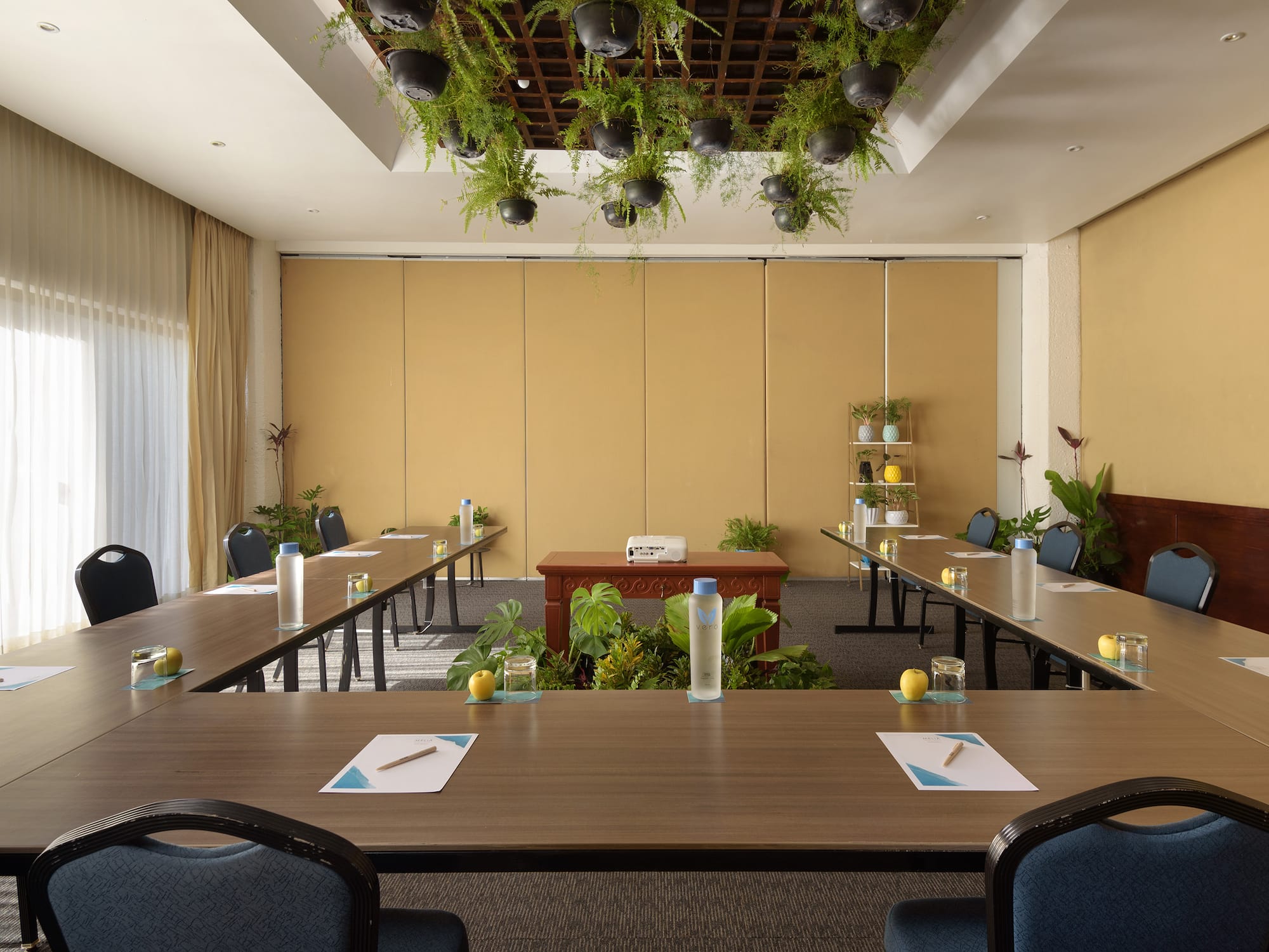 a room with tables and chairs