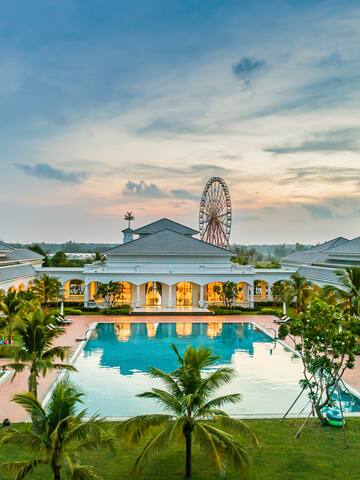 a swimming pool and a ferris wheel